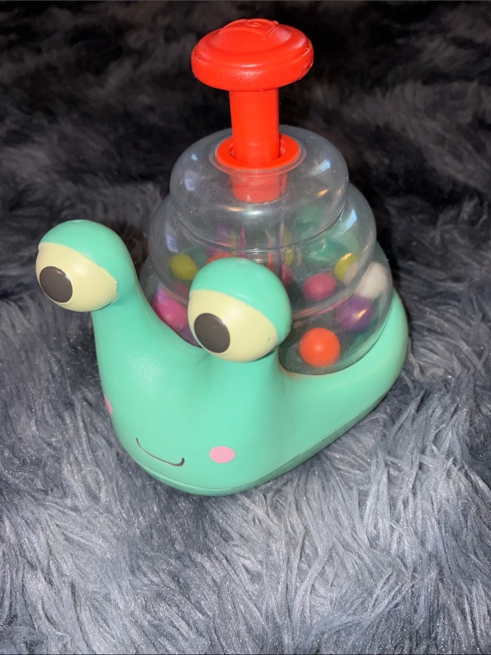 B. toys Light-up Snail Ball Popper Escar-Gloooooow roll